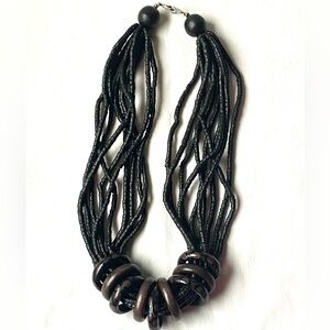 10 Strand Beaded Chocker Style Necklace With Carved Round Painted Wooden Rings